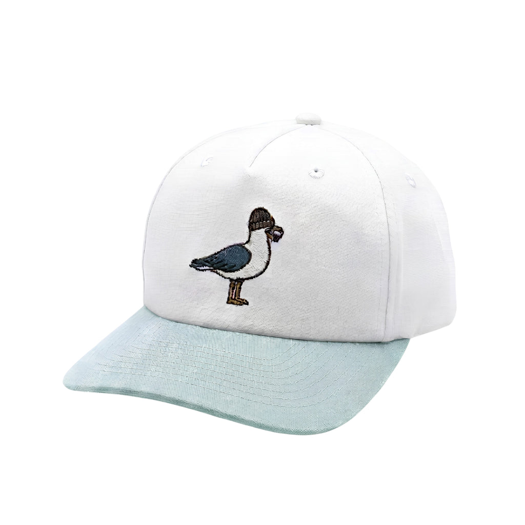 A white baseball cap with a light blue brim, featuring an embroidered duckling design on the front.