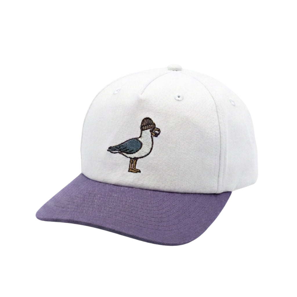 A white structured baseball cap with a contrasting purple brim, featuring an embroidered seagull design on the front.