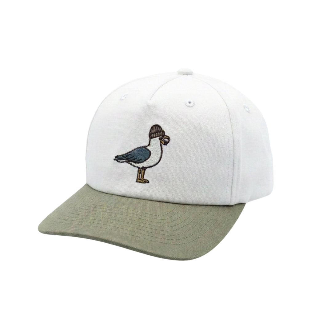 A structured baseball cap with a white crown and an olive green curved brim, featuring an embroidered bird design on the front.