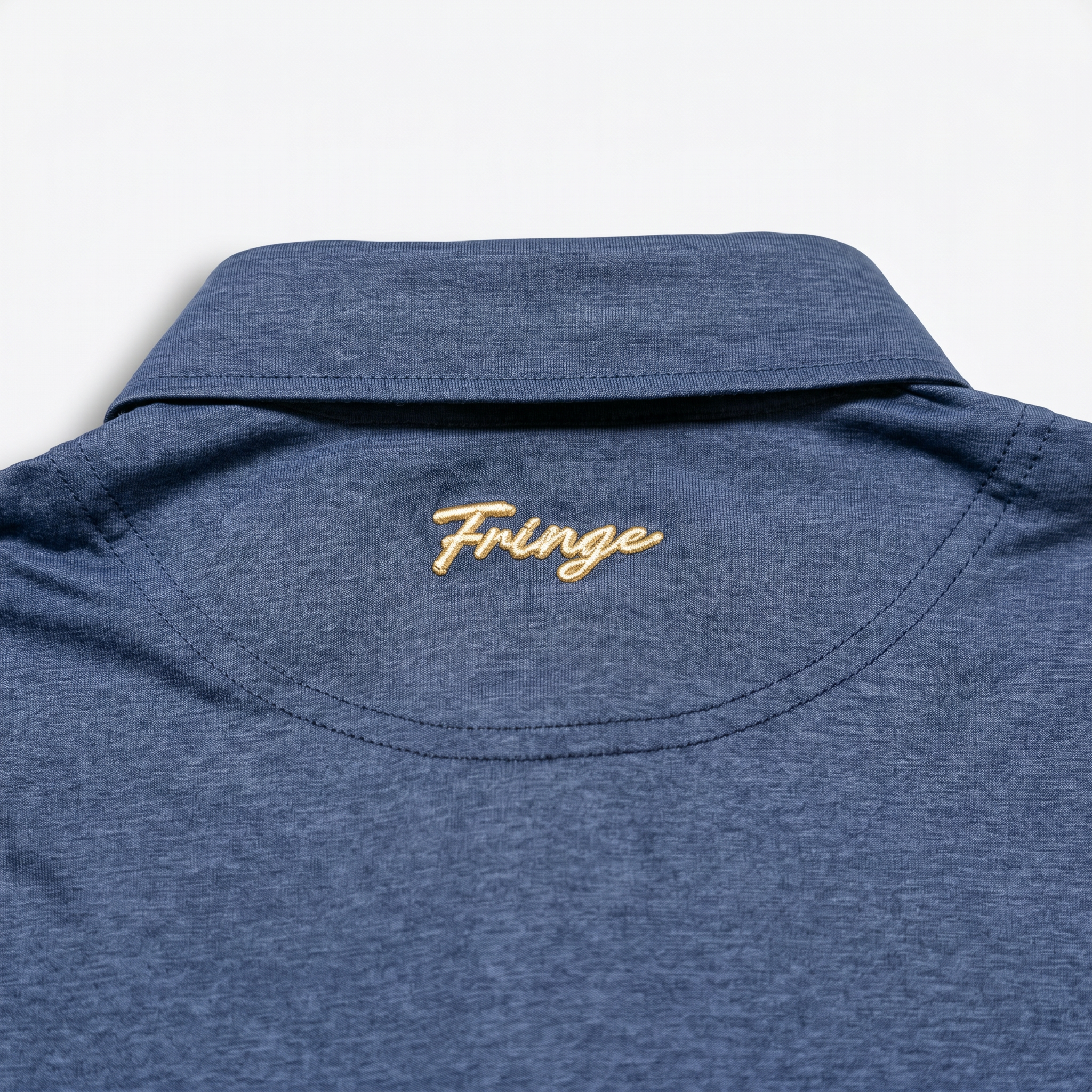 Blue shirt collar with 'Fringe' embroidery on a light gray background