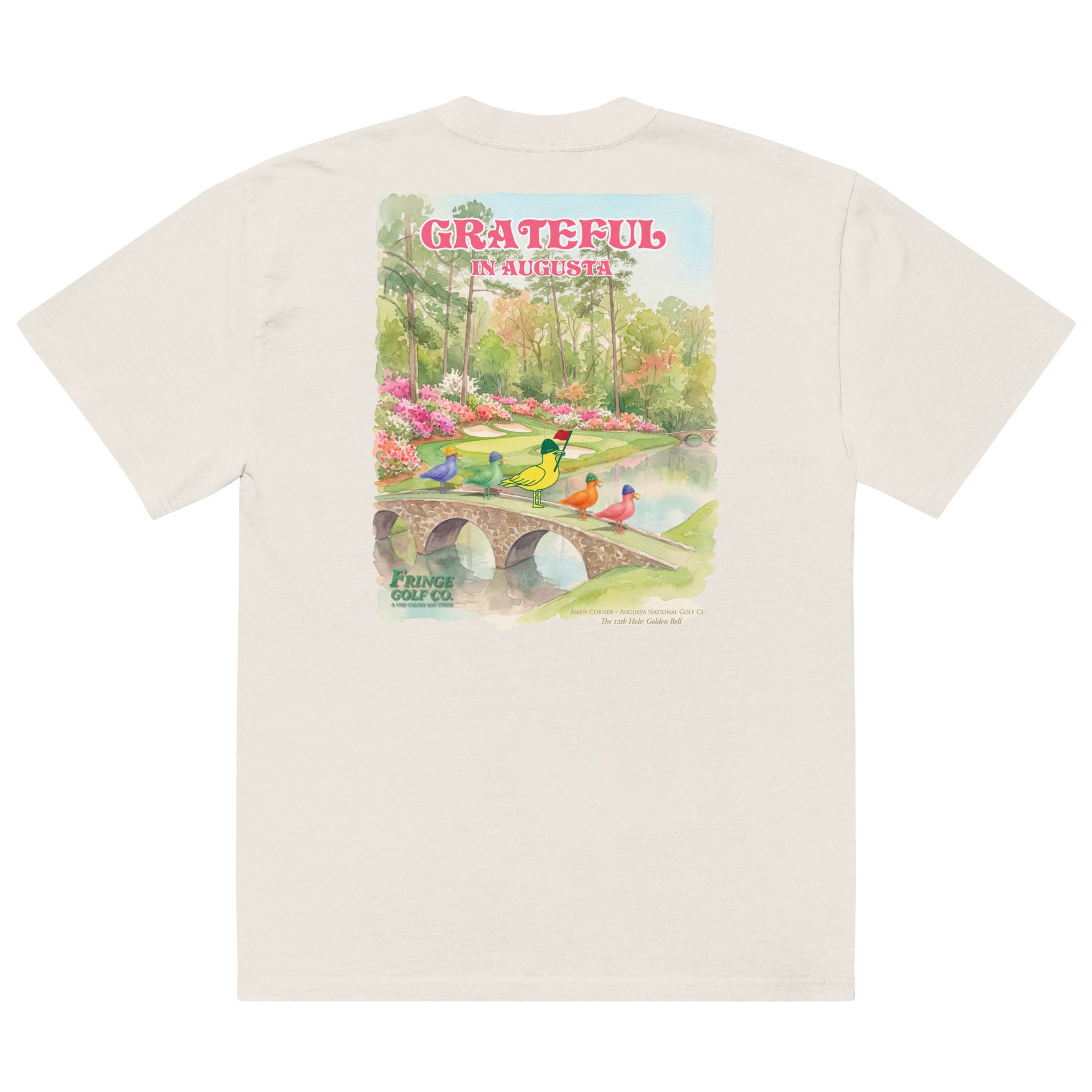 Beige t-shirt with a colorful graphic of birds on a bridge and 'Grateful' text on a white background